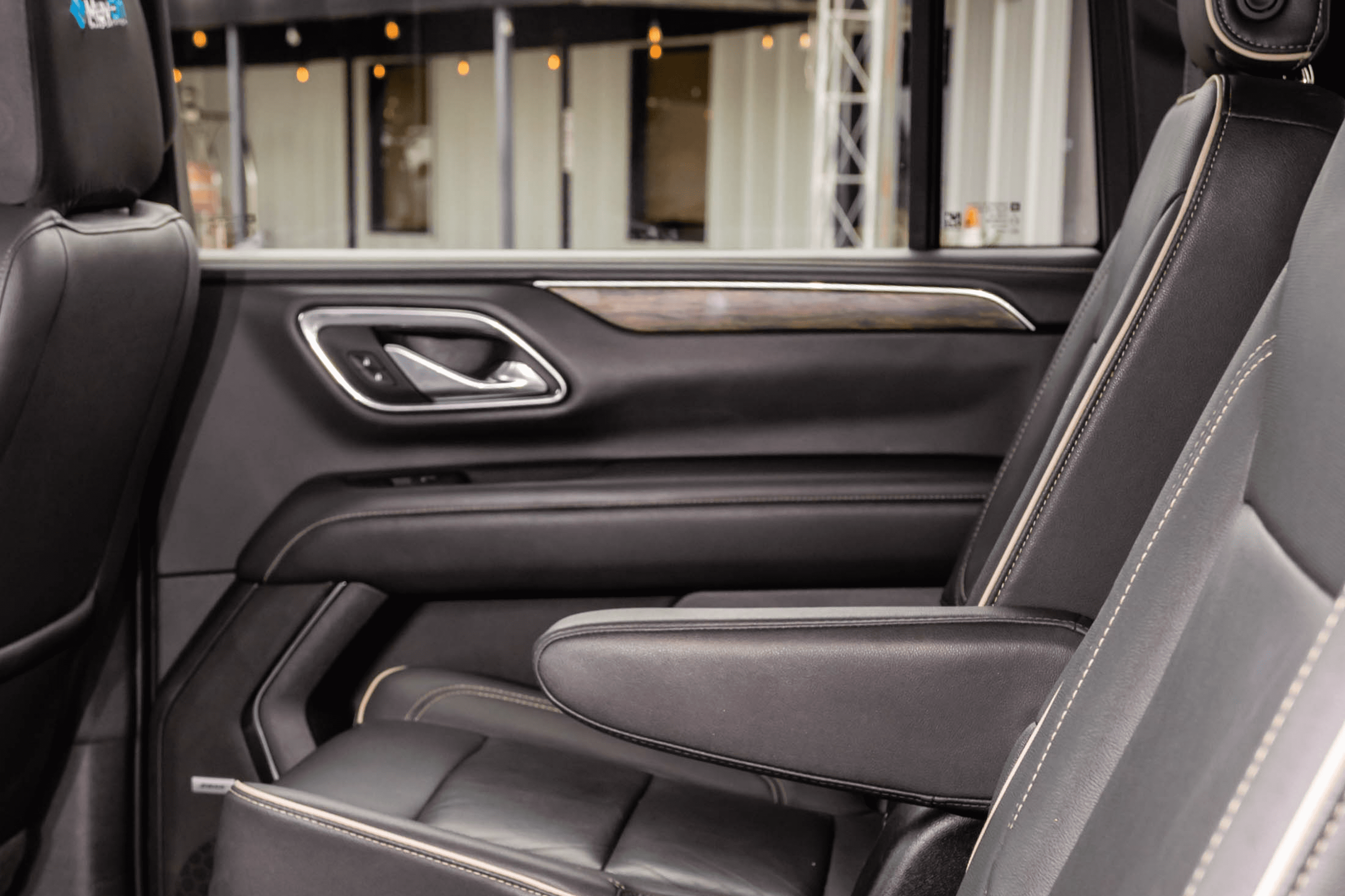 Black leather car seat and door panel